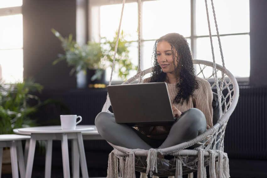 Woman sitting with computer
